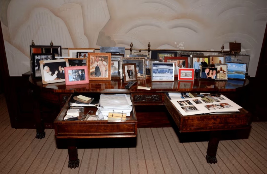 A view of drawers and framed photos shown in Jeffrey Epstein's Manhattan home are seen in this image released by the Department of Justice in Washington, D.C., U.S., on December 19, 2025 as part of a new trove of documents from its investigations into the late financier and convicted sex offender Jeffrey Epstein. U.S. Justice Department/Handout via REUTERS 