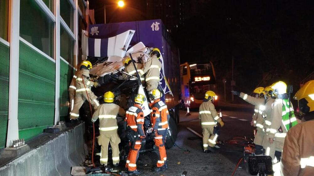 Truck driver trapped for two hours after hitting noise barrier in ...