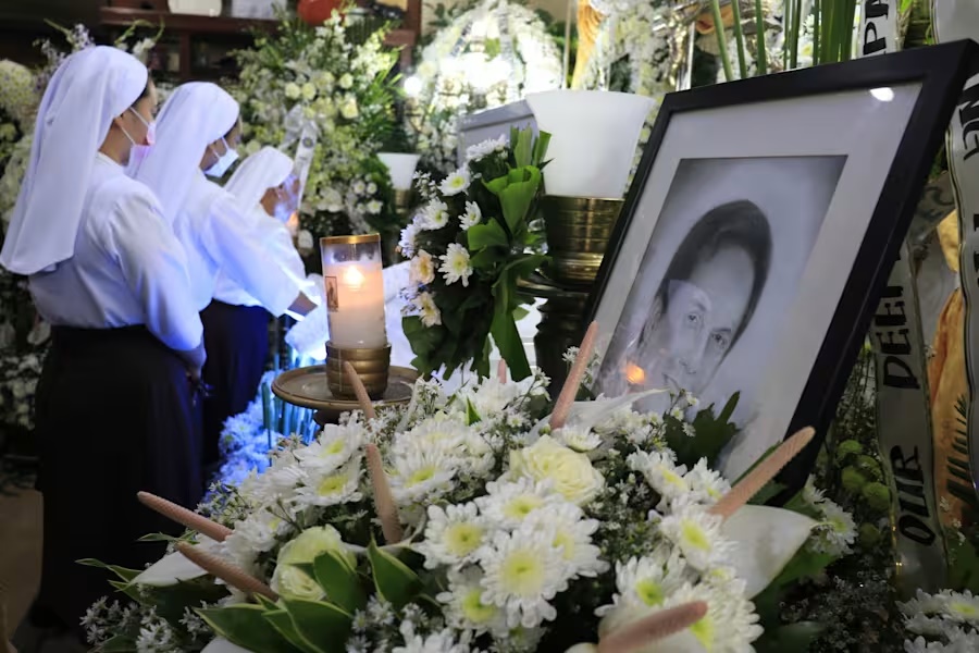 FILE - Catholic nuns visit the wake of Negros Oriental Gov. Roel Degamo at his home in Dumaguete city, central Philippines on March 6, 2023. (AP Photo/Alan Tangcawan, File) (Alan Tangcawan, Copyright 2023 The Associated Press. All rights reserved.)