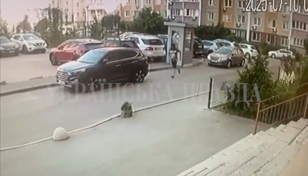 A CCTV footage shows the purported killer running moments after the shooting of a Security Service of Ukraine (SBU) officer in Kyiv, Ukraine July 10, 2025 in this screengrab obtained from a social media video. (Reuters)