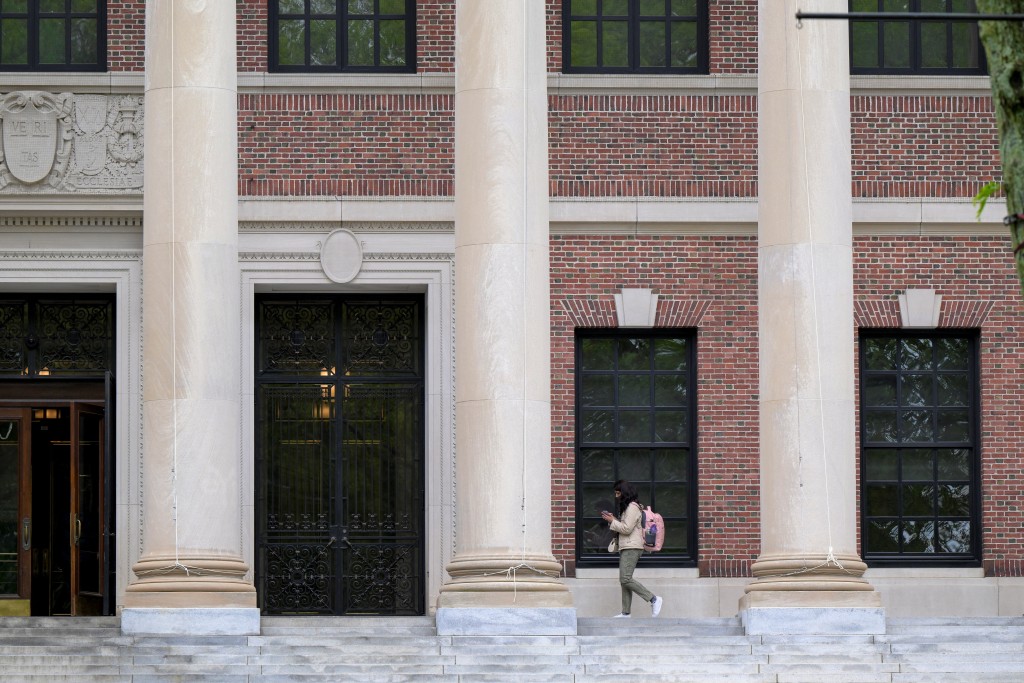 A student walks on the campus of Harvard University in Cambridge, Massachusetts, U.S., May 23, 2025. (Reuters)
