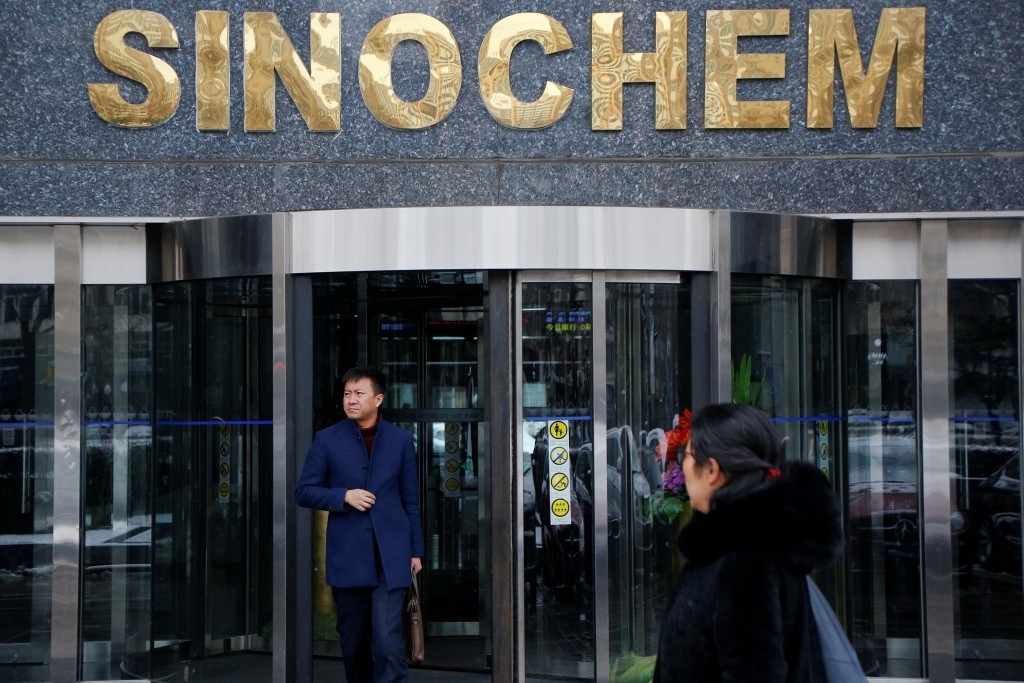 A man walks out of a Sinochem office building in Beijing, China February 21, 2017. REUTERS