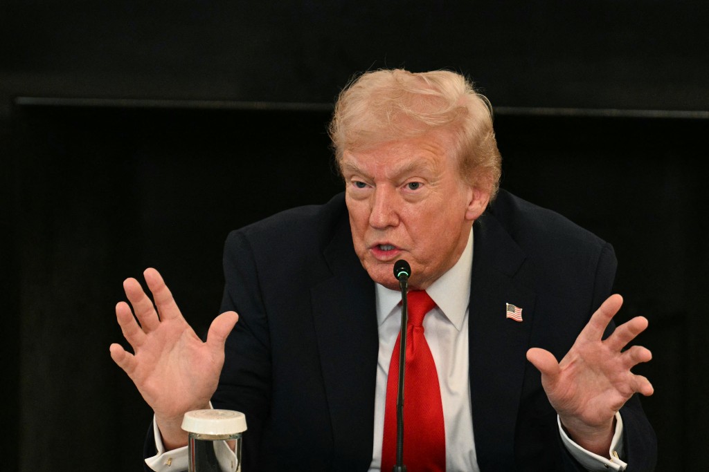 US President Donald Trump speaks during a roundtable about Antifa in the State Dining Room of the White House in Washington, DC, on October 8, 2025. (Photo by Jim WATSON / AFP)