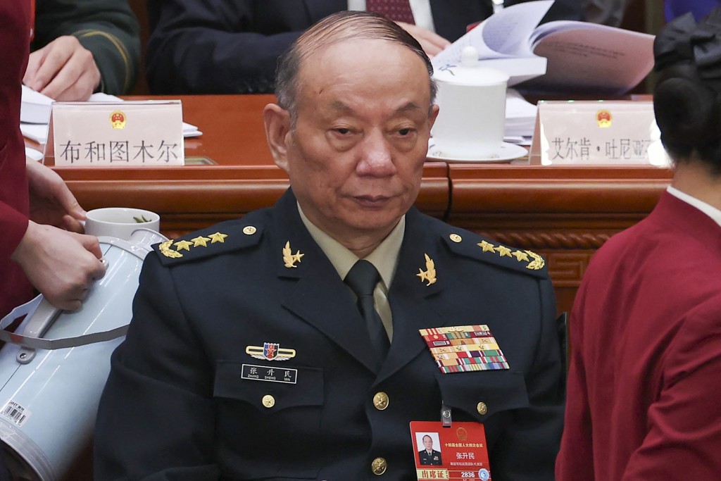 Photo by FLORENCE LO / POOL / AFP Chinese Central Military Commission Vice Chairman Zhang Shengmin attends the opening session of the National People's Congress (NPC) at the Great Hall of the People in Beijing on March 5, 2026.