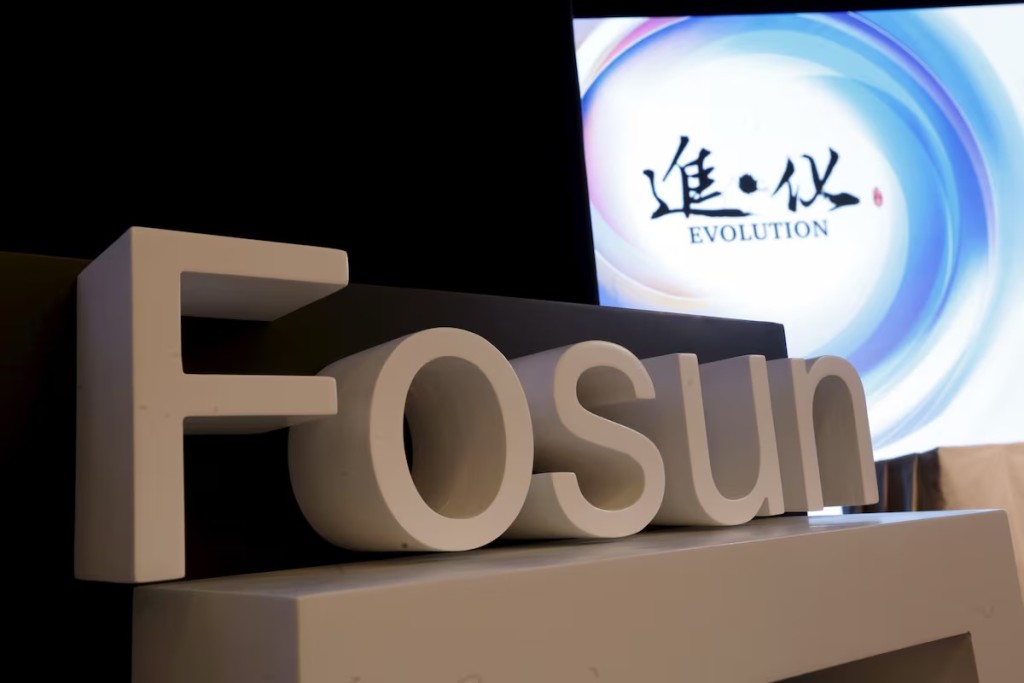 The company's founder Guo Guangchang reportedly led a team to meet with Chief Executive John Lee and Financial Secretary Paul Chan on August 6. Photo by REUTERS