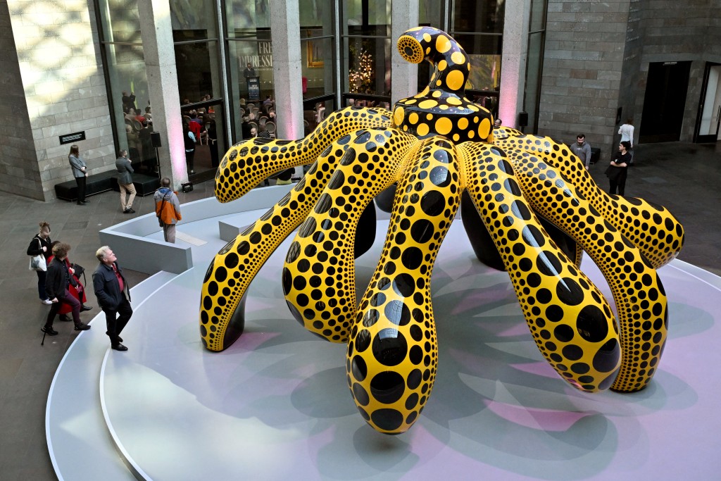People look at an artwork titled 'Dancing Pumpkin' by Japanese artist Yayoi Kusama at the National Gallery of Victoria (NGV) in Melbourne on June 5, 2025. (AFP) People look at an artwork titled 'Dancing Pumpkin' by Japanese artist Yayoi Kusama at the National Gallery of Victoria (NGV) in Melbourne on June 5, 2025. (AFP)