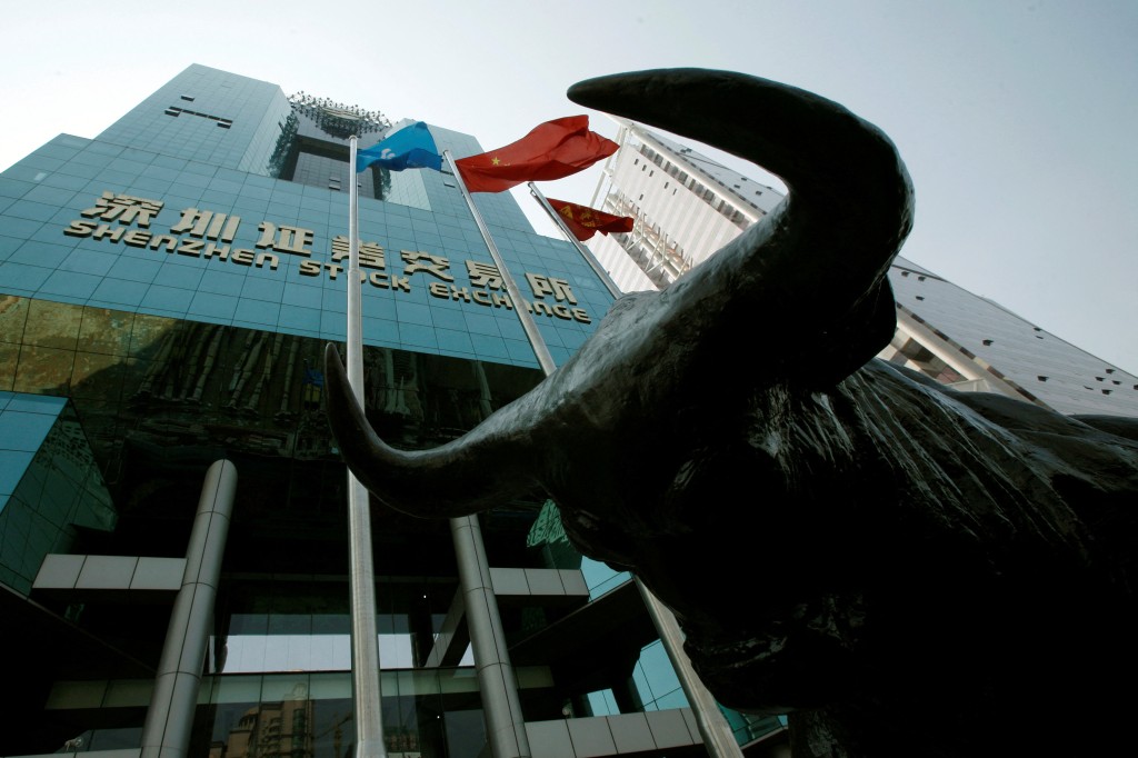 A statue of a bull is displayed outside the Shenzhen Stock Exchange in the southern Chinese city of Shenzhen, October 23, 2009.  REUTERS