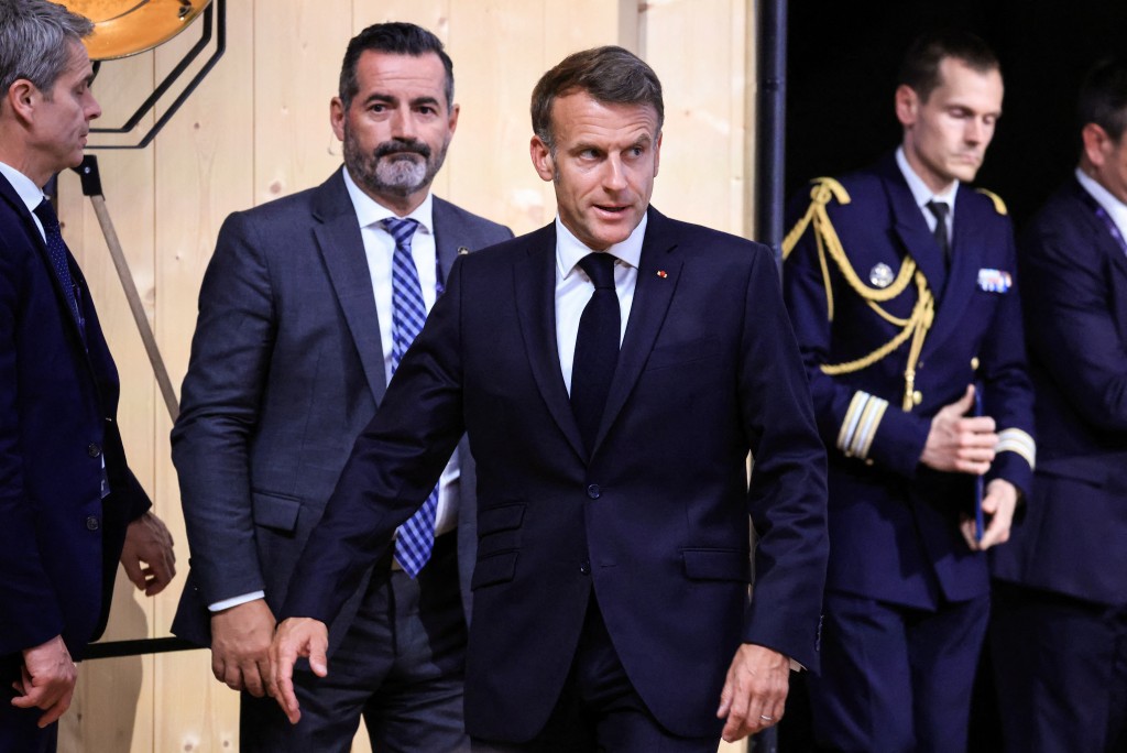 Photo by LUDOVIC MARIN / AFP. France's President Emmanuel Macron arrives for the closing press conference of the G7 summit, in Evian, eastern France, on June 17, 2026.