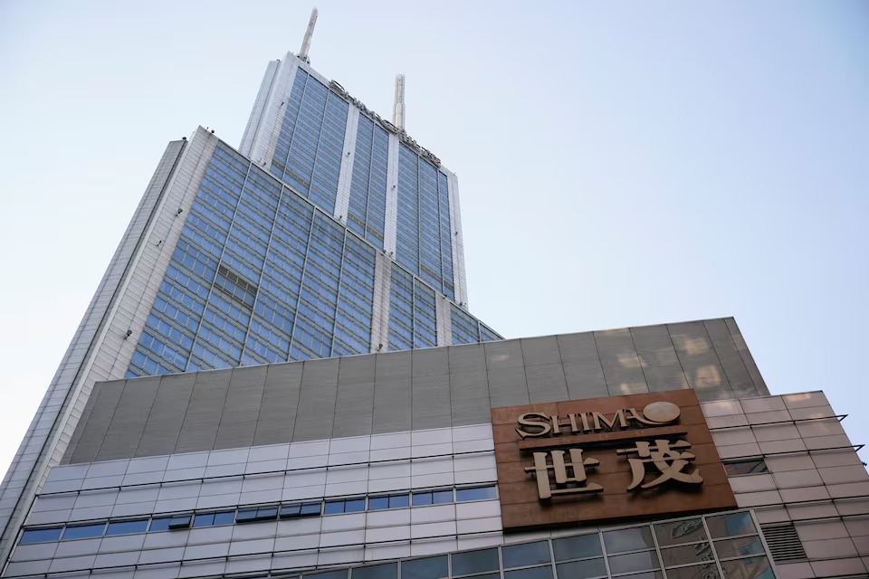 The logo of property developer Shimao Group is seen on the facade of Shimao International Plaza in Shanghai. (Reuters) The logo of property developer Shimao Group is seen on the facade of Shimao International Plaza in Shanghai. (Reuters)