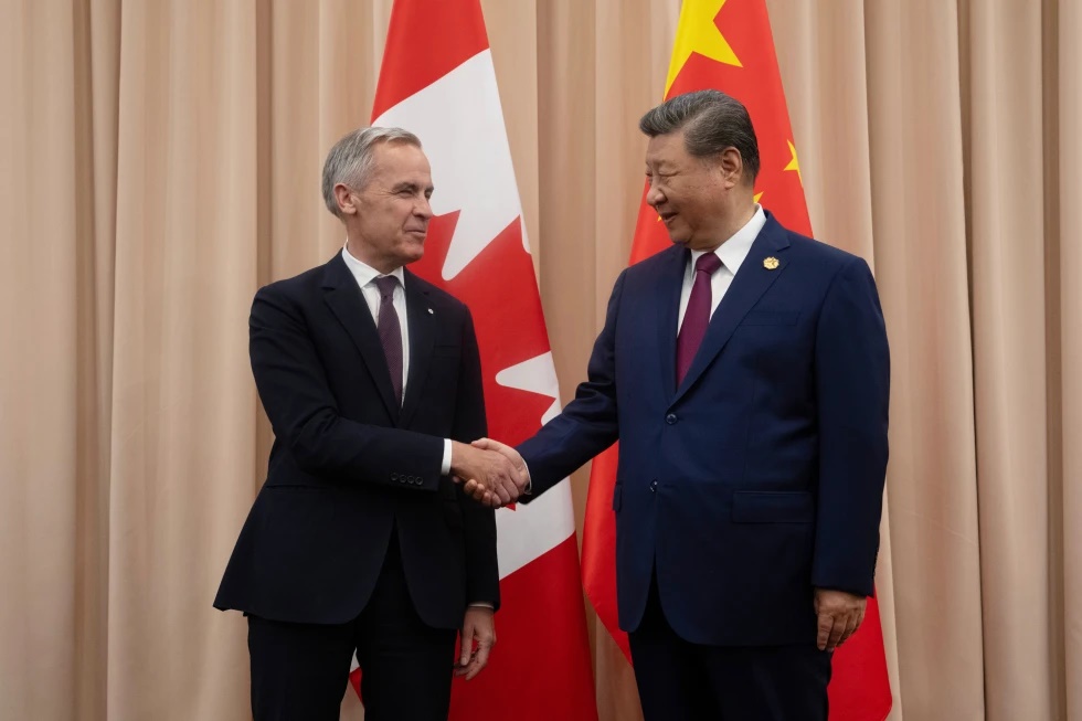 Canadian Prime Minister Mark Carney, left, shakes hands with Chinese President Xi Jinping at the start of a meeting in Gyeongju, South Korea, Oct. 31, 2025. (Adrian Wyld/The Canadian Press via AP, File)