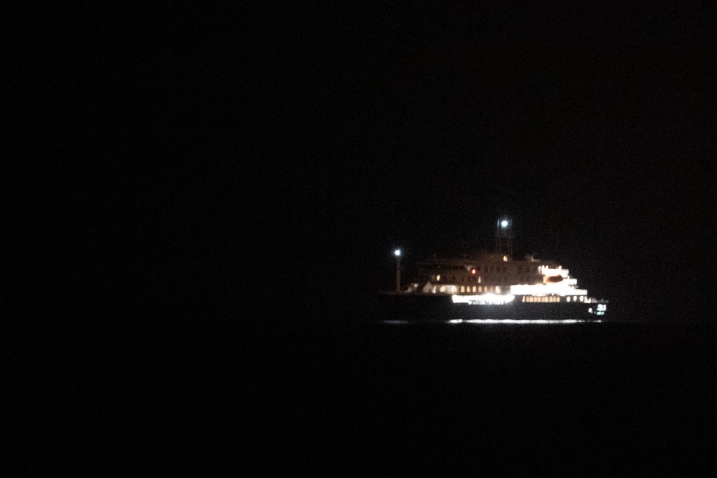 The Dutch-flagged hantavirus-stricken cruise ship MV Hondius sails near El Medano, Tenerife, in the Canary Islands, Spain early on May 10, 2026. (AFP)