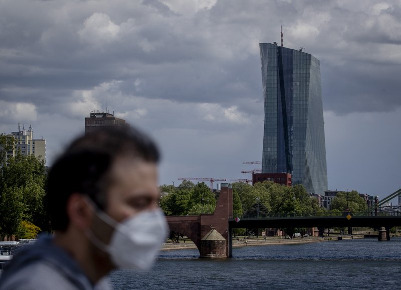 A man walks in front of the European Central Bank in Frankfurt, Germany. (AP photo) A man walks in front of the European Central Bank in Frankfurt, Germany. (AP photo)