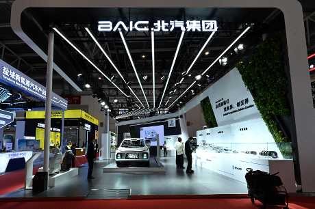 People visit the booth of BAIC Motor during the 2nd China International Supply Chain Expo in Beijing on November 28, 2024. AFP People visit the booth of BAIC Motor during the 2nd China International Supply Chain Expo in Beijing on November 28, 2024. AFP