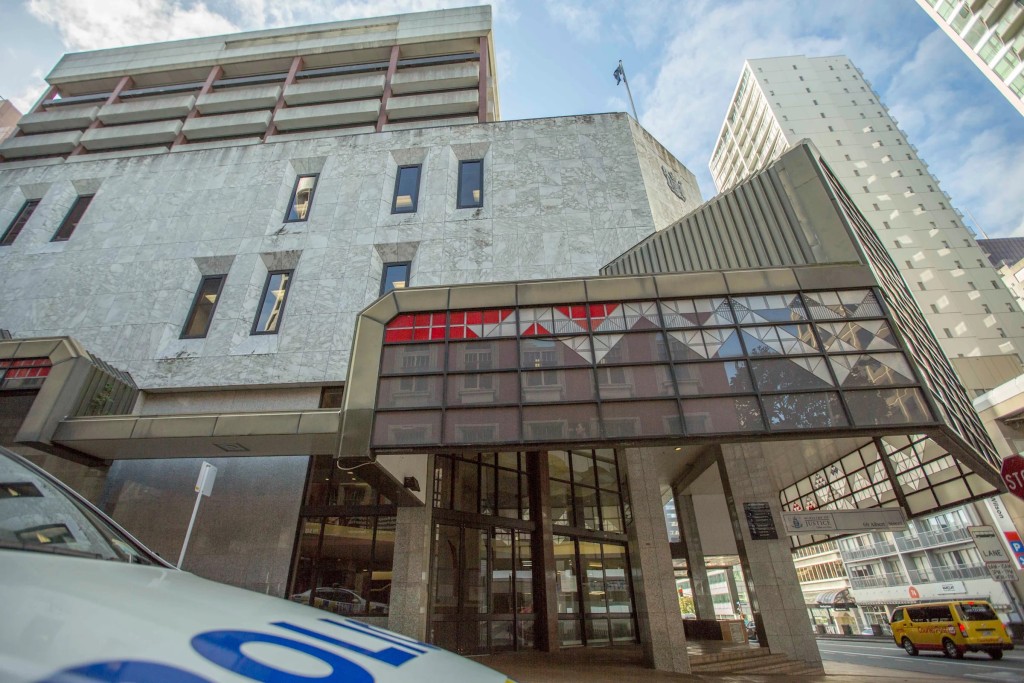 A police car is parked outside the Auckland District Court in Auckland, New Zealand, Aug. 17, 2015. (Bevan Read/Fairfax NZ/STUFF via AP)