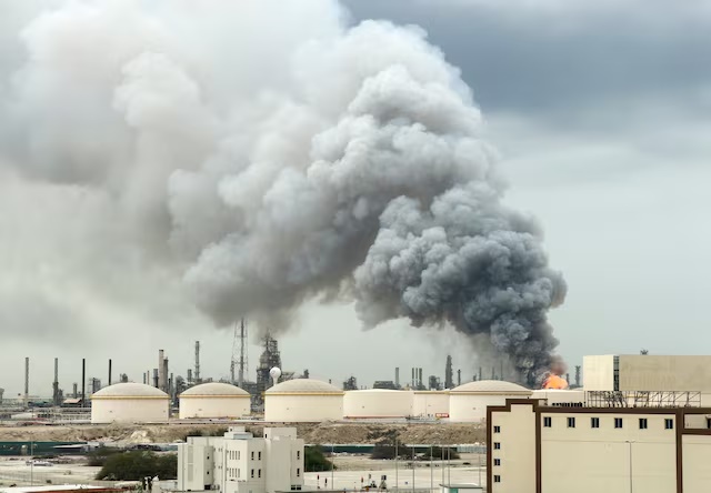 Smoke rises following a strike on the Bapco Oil Refinery, amid the U.S.-Israeli conflict with Iran, on Sitra Island, Bahrain, March 9, 2026. REUTERS/Stringer 
