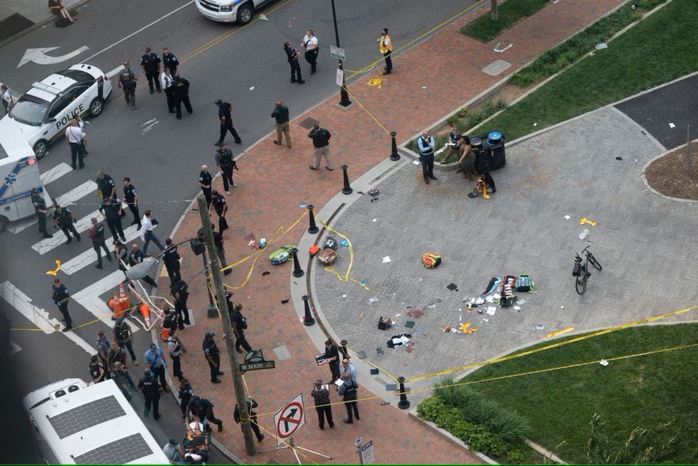 Law enforcement officers investigate at the scene after a shooter opened fire in a park as high school graduates and their families emerged from a theater where commencement exercises had just concluded, in Richmond, Virginia, U.S. June 6, 2023. (Reuters) Law enforcement officers investigate at the scene after a shooter opened fire in a park as high school graduates and their families emerged from a theater where commencement exercises had just concluded, in Richmond, Virginia, U.S. June 6, 2023. (Reuters)