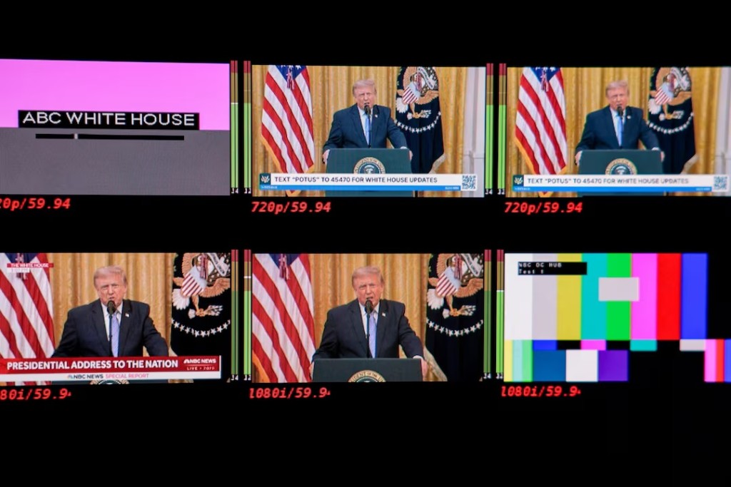  Screens inside the James S. Brady Press Briefing Room of the White House display U.S. President Donald Trump speaking about election security during an address to the nation from the East Room of the White House, except for ABC and NBC, who chose to not air the address live on their primary platforms, in Washington, D.C., U.S., July 16, 2026. REUTERS/Kylie Cooper