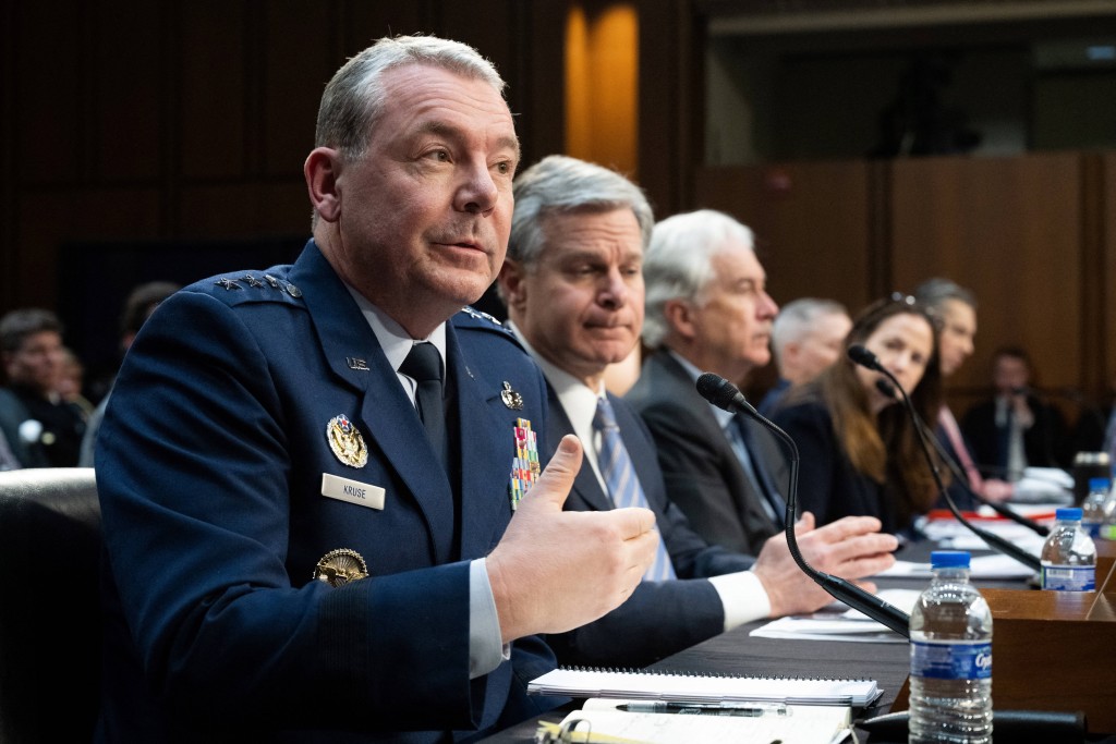 Director of the Defense Intelligence Agency Lieutenant General Jeffrey Kruse, FBI Director Christopher Wray, CIA Director William Burns, Director of National Intelligence Avril Haines, US Air Force Lieutenant General Timothy Haugh and Assistant Secretary of State for Intelligence and Research Brett Holmgren (Photo by SAUL LOEB / AFP)