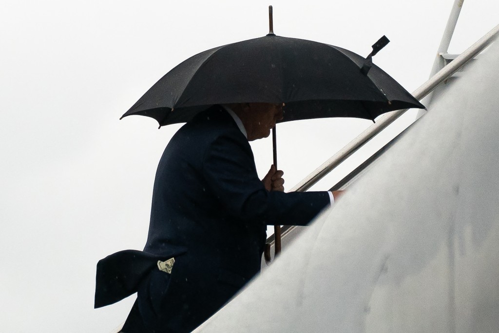 U.S. President Donald Trump boards Air Force One at Palm Beach International Airport on March 15, 2026 in West Palm Beach, Florida. (AFP)