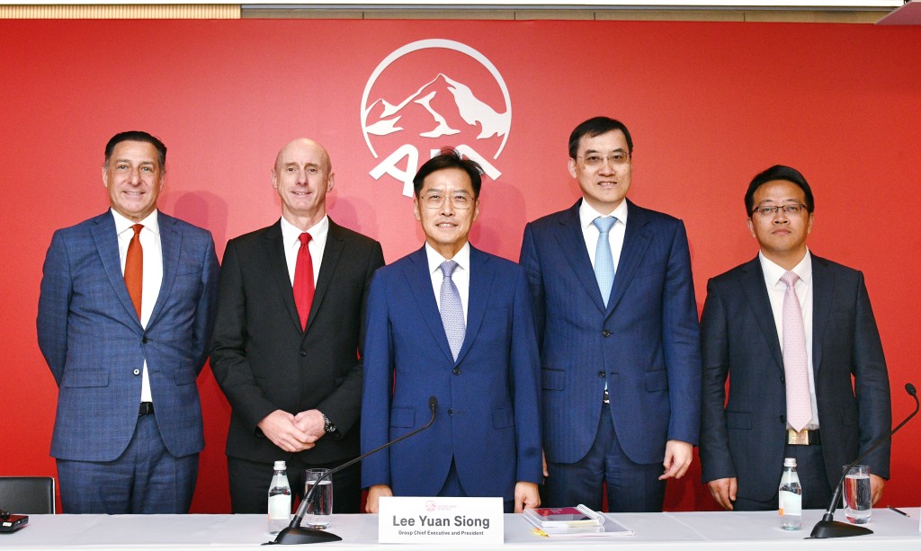 From left: John Barrie Harrison, independent non-executive director; Garth Jones, AIA’s group chief financial officer; Lee Yuan-siong, AIA’s executive director and group chief executive and president; Jacky Chan; Fisher Zhang, AIA’s regional chief executive