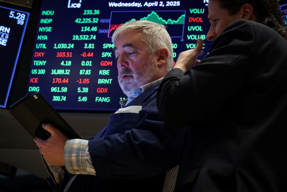 Traders work on the floor at the New York Stock Exchange (NYSE) in New York City, U.S., April 2, 2025. REUTERS Traders work on the floor at the New York Stock Exchange (NYSE) in New York City, U.S., April 2, 2025. REUTERS