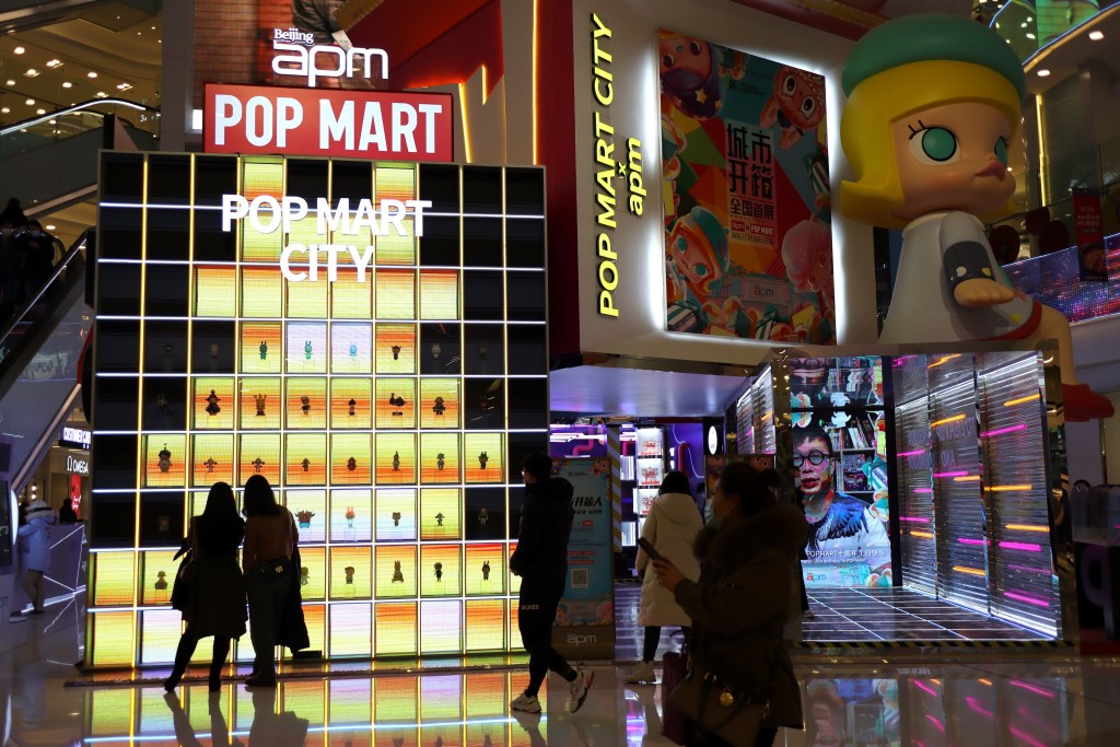 A booth of Chinese toy maker Pop Mart is seen at a shopping mall in Beijing, China December 9, 2020. Picture taken December 9, 2020. REUTERS