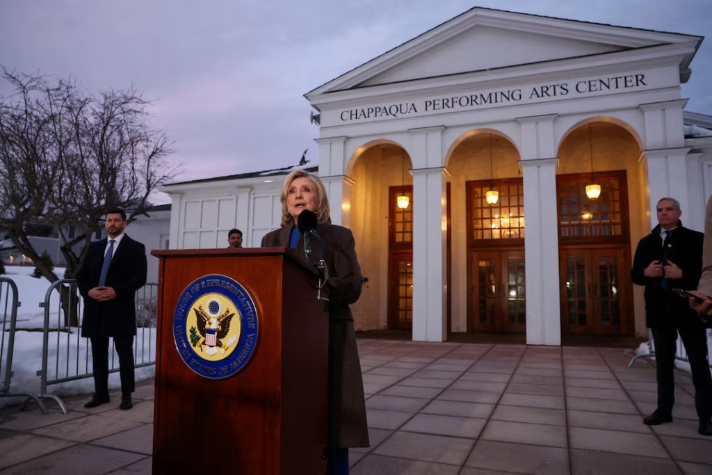  Former Secretary of State Hillary Clinton speaks to the members of the media outside the Chappaqua Performing Arts Center, on the day she appears for a deposition in the House Oversight Committee investigation of late financier and convicted sex offender Jeffrey Epstein, in Chappaqua, New York, U.S., February 26, 2026. REUTERS/Shannon Stapleton