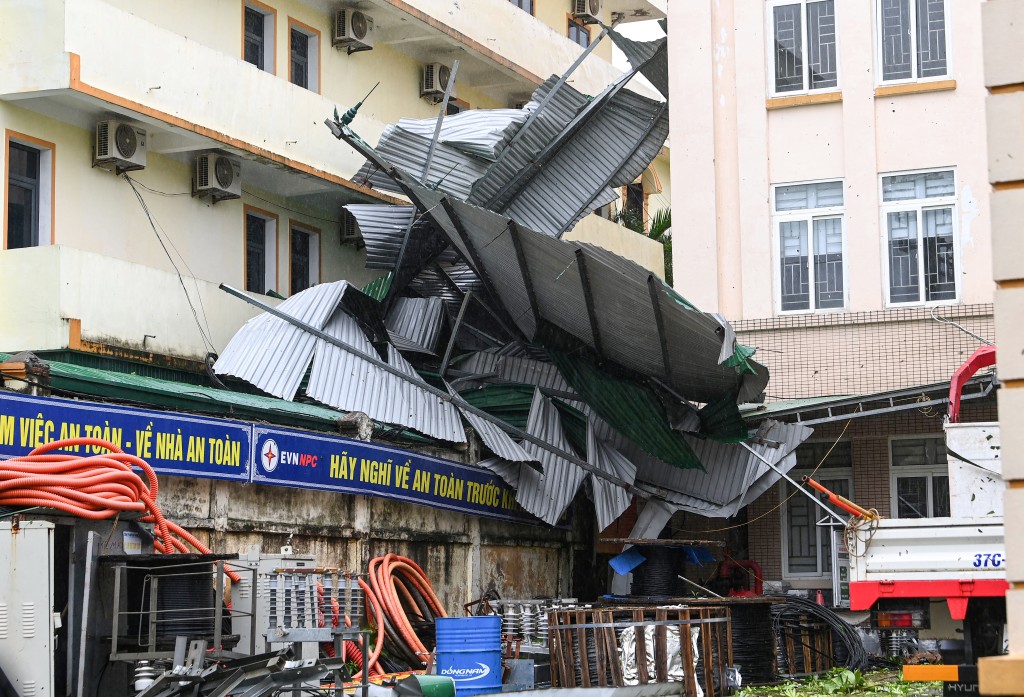 A corrugated iron roof blown off after typhoon Bualoi made a landfall in Nghe An province on September 29, 2025. (AFP)