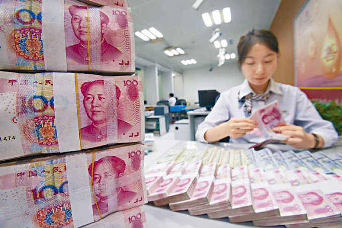 Goldman Sachs expects the onshore yuan to reach 7.0 against the greenback within six months. SING TAO