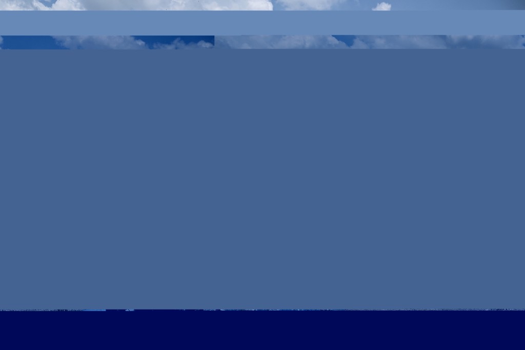 Photo by LILLIAN SUWANRUMPHA / AFP  This photo taken on March 30, 2026 shows agricultural drone operators preparing to spray microbial solution Soil Digest onto crop stubble in a rice paddy in Pathum Thani province.