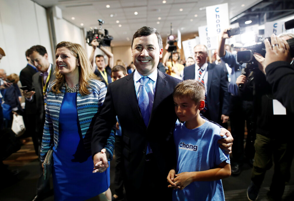 Allegations made by Michael Chong, seen with his family, have led to the expulsions of Zhao Wei, inset, and Jennifer Lalonde. Wang Wenbin, above, and Melanie Joly, below. AGENCIES