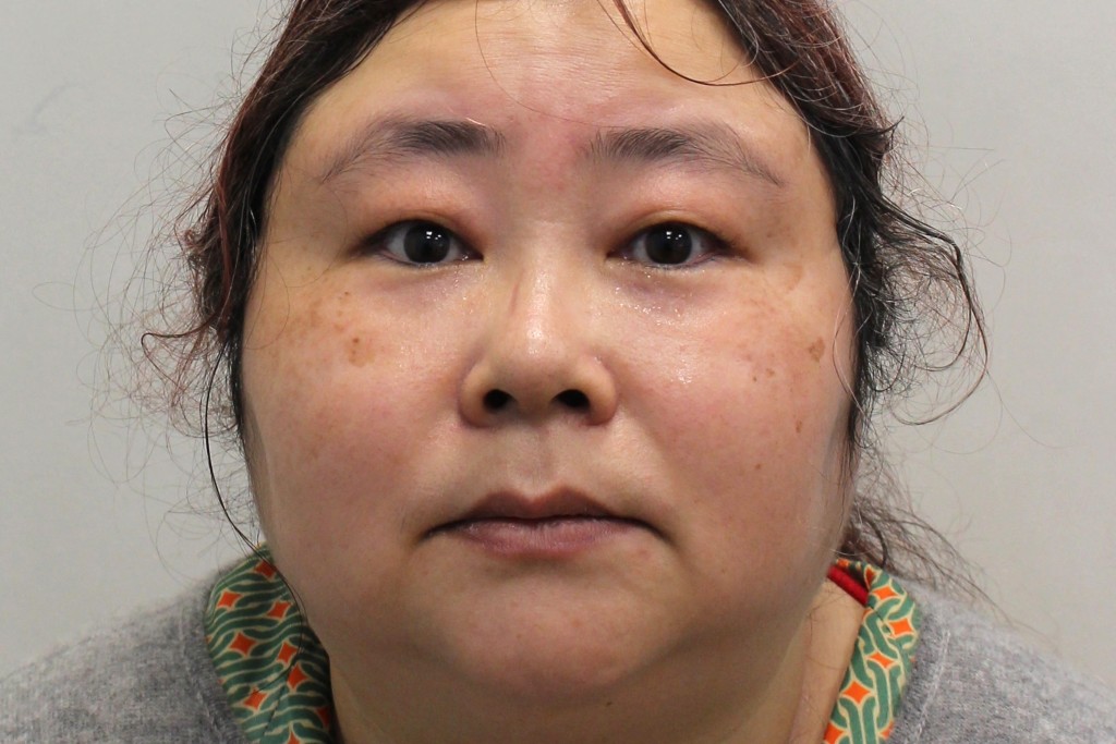 Photo by - / METROPOLITAN POLICE / AFP An undated handout picture released by the Metropolitan Police Service (MPS) on September 29, 2025 and accessed on November 9, 2025 shows Chinese national Zhimin Qian, alias Yadi Zhang, who was convicted for over her role in a multi billion-dollar Bitcoin fraud, posing for a photograph.