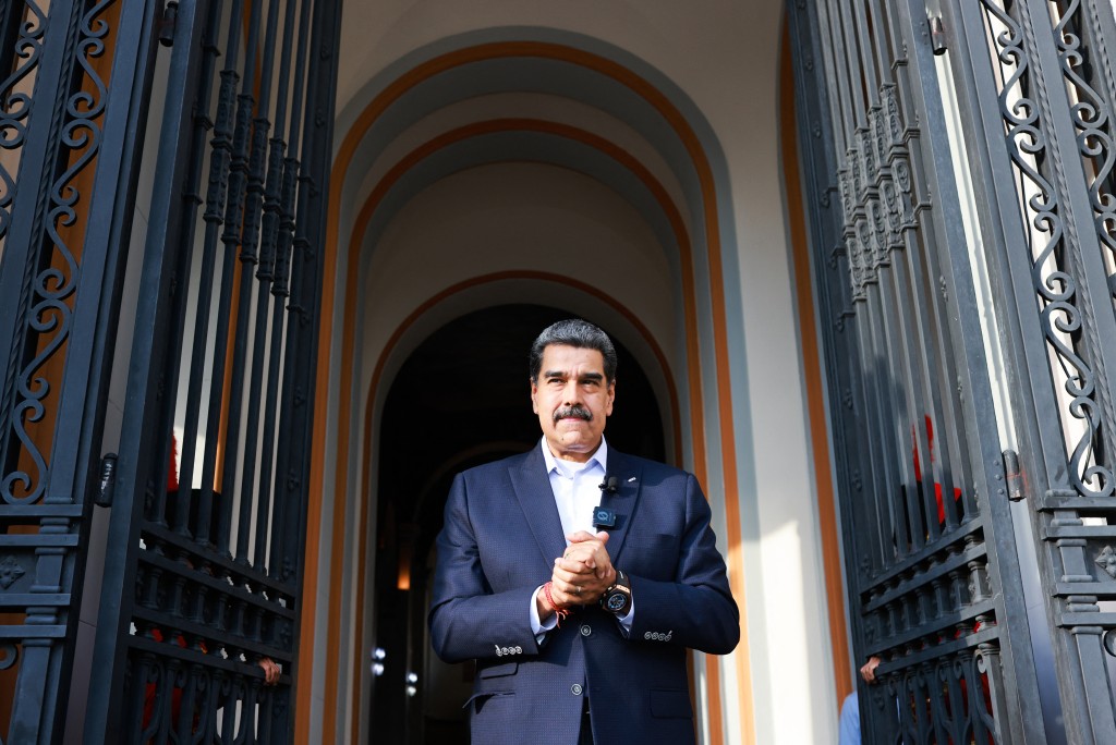 Photo by MARCELO GARCIA / VENEZUELAN PRESIDENCY / AFP  This handout picture released by the Venezuelan Presidency shows Venezuela's President Nicolas Maduro gesturing during an official TV show in Caracas on October 27, 2025.