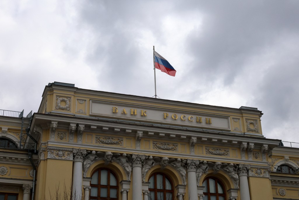 A flag flies above the headquarters of the Russian Central Bank on the day of a key rate-setting meeting in Moscow, Russia, April 24, 2026. REUTERS