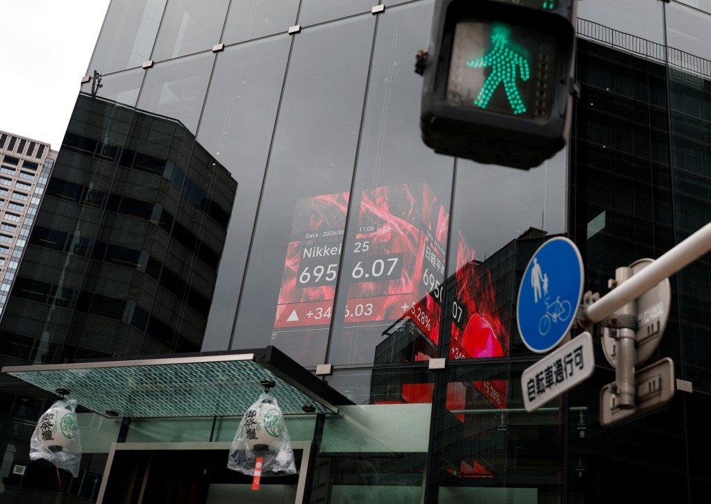 A large monitor showing the Nikkei share average at a commercial building in Tokyo, Japan, June 15, 2026. REUTERS