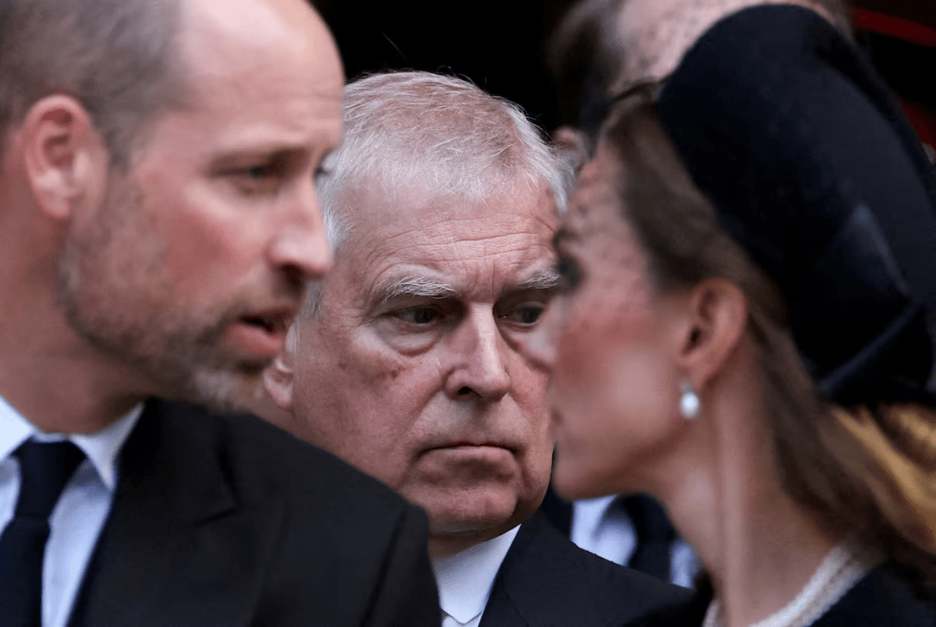 Britain's Prince Andrew stands next to Prince William and his wife Catherine, Princess of Wales, as they leave Westminster Cathedral at the end of the Requiem Mass, on the day of the funeral of Britain's Katharine, Duchess of Kent, in London, Britain, September 16, 2025. REUTERS/Toby Melville/File Photo