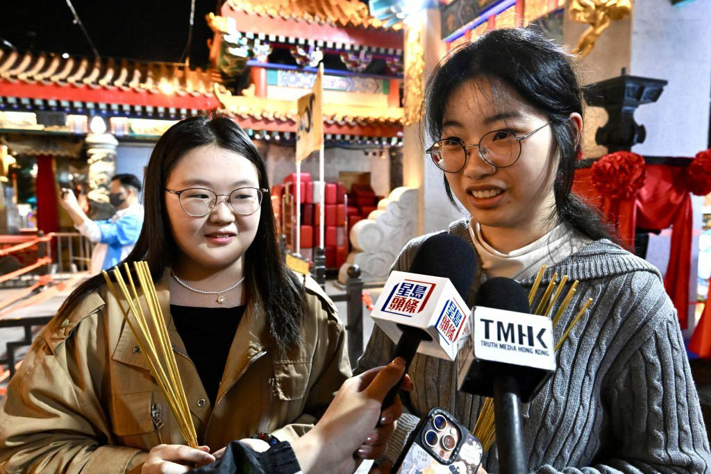 Two mainland postgraduate students from Henan and Jiangxi