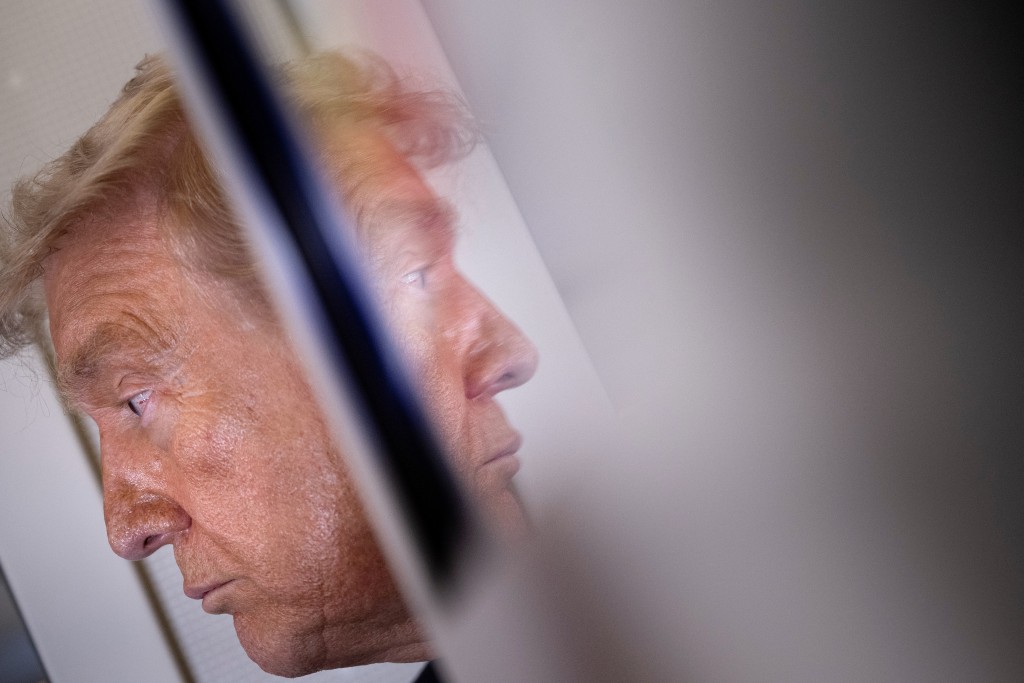 Photo by BRENDAN SMIALOWSKI / AFP. US President Donald Trump speaks to reporters aboard Air Force One after his departure from Beijing Capital Airport on May 15, 2026, on his way back to the United States.