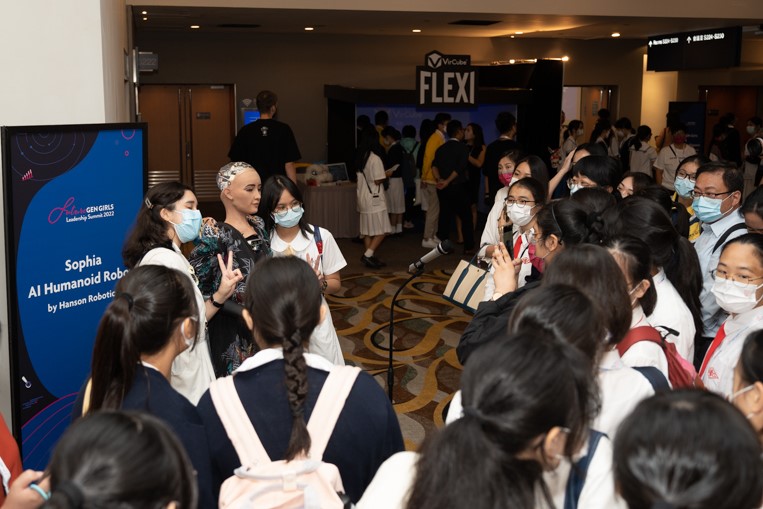 Students were keen to make friends with Sophia, the Sophia, AI Humanoid Robot.