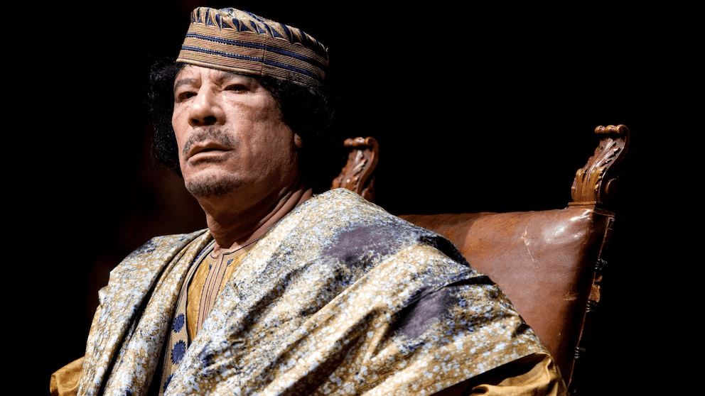 FILE - Libyan leader Muammar Gadhafi delivers his speech during a meeting with hundreds of prominent Italian women in a concert hall, June 12, 2009, in Rome. The former Libyan leader was captured and killed by rebels shortly after the International Criminal Court issued a warrant for his arrest on charges linked to the brutal suppression of anti-government protests in 2011. (AP Photo/Andrew Medichini, File) FILE - Libyan leader Muammar Gadhafi delivers his speech during a meeting with hundreds of prominent Italian women in a concert hall, June 12, 2009, in Rome. The former Libyan leader was captured and killed by rebels shortly after the International Criminal Court issued a warrant for his arrest on charges linked to the brutal suppression of anti-government protests in 2011. (AP Photo/Andrew Medichini, File)
