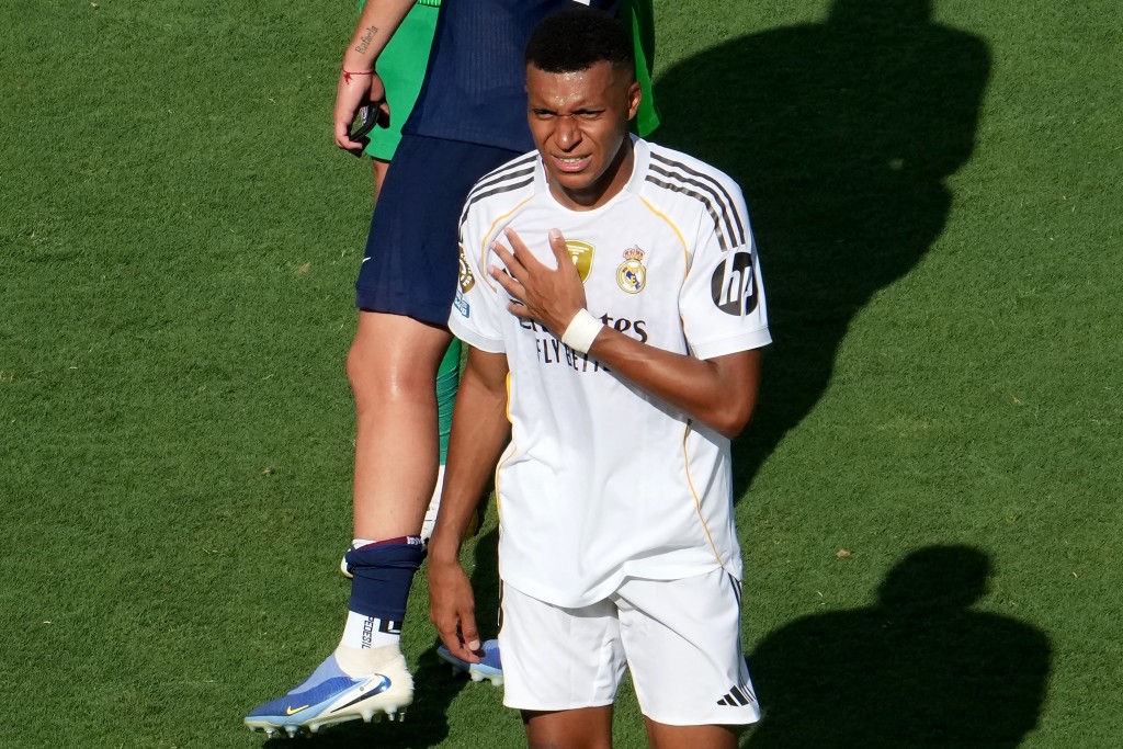 Real Madrid's French forward #09 Kylian Mbappe reacts at the end of the FIFA Club World Cup 2025 semifinal football match between France's Paris Saint-Germain and Spain's Real Madrid at MetLife stadium in East Rutherford, New Jersey on July 9, 2025. (Photo by TIMOTHY A. CLARY / AFP)