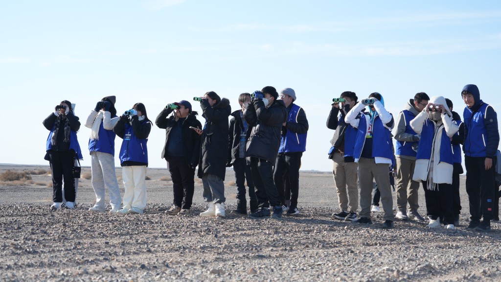 Students wait for the “Nurturing the Future” rocket to launch.