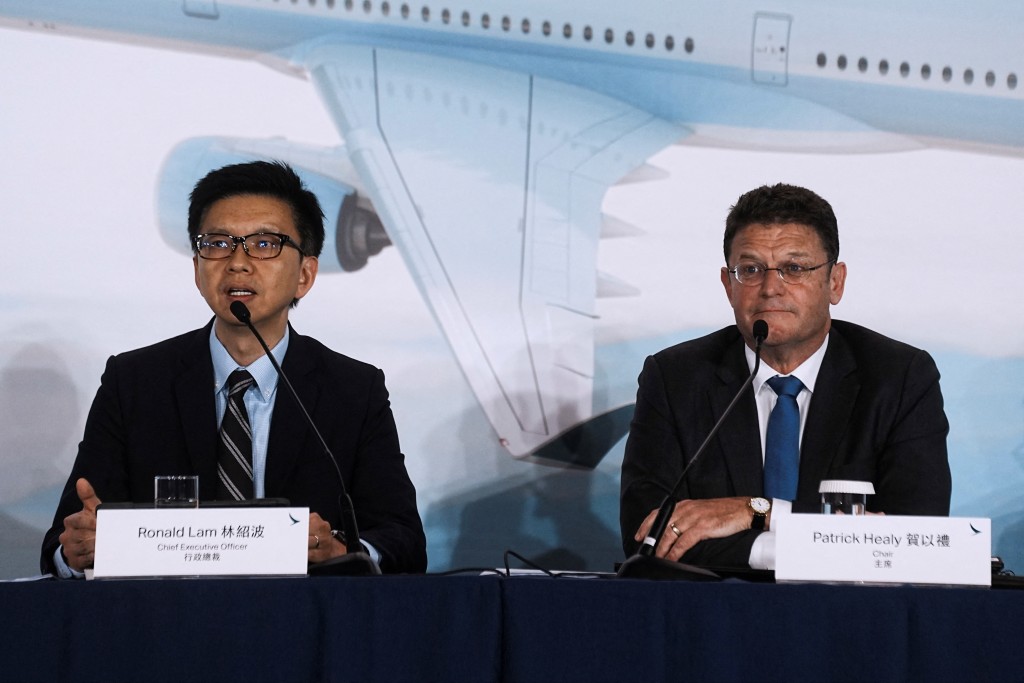 Ronald Lam, left. Reuters.