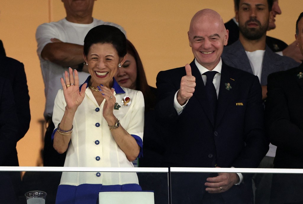 Japan's Hisako, Princess Takamado (L) and FIFA President Gianni Infantino waves to the crowd during the 2026 World Cup Group F football match between Tunisia and Japan (AFP)