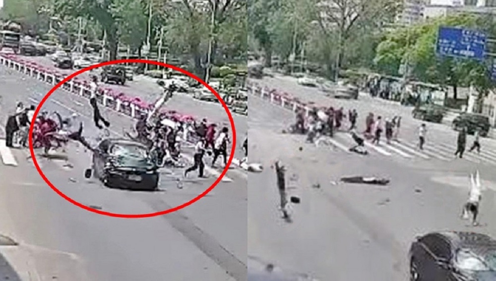 Video grabs show a black car driving into pedestrians. Video grabs show a black car driving into pedestrians.