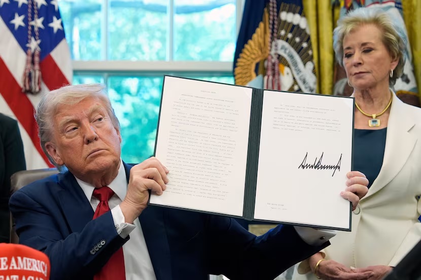 President Donald Trump holds a signed an executive order relating to school discipline policies as Education Secretary Linda McMahon listens in the Oval Office of the White House, Wednesday, April 23, 2025, in Washington. (AP Photo/Alex Brandon)(Alex Brandon / AP)