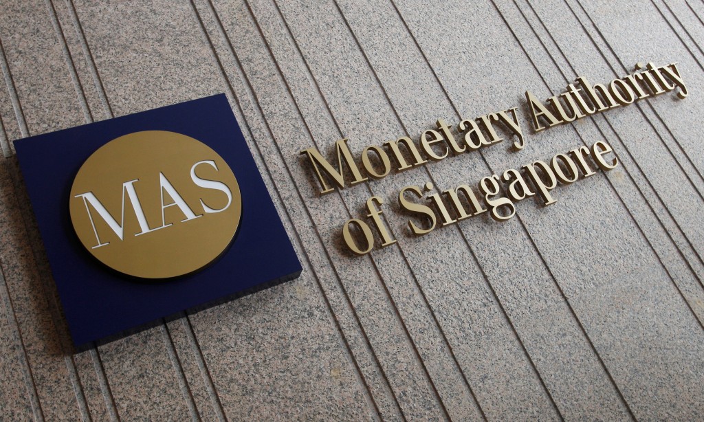 The logo of the Monetary Authority of Singapore (MAS) is pictured at its building in Singapore February 21, 2013.  REUTERS