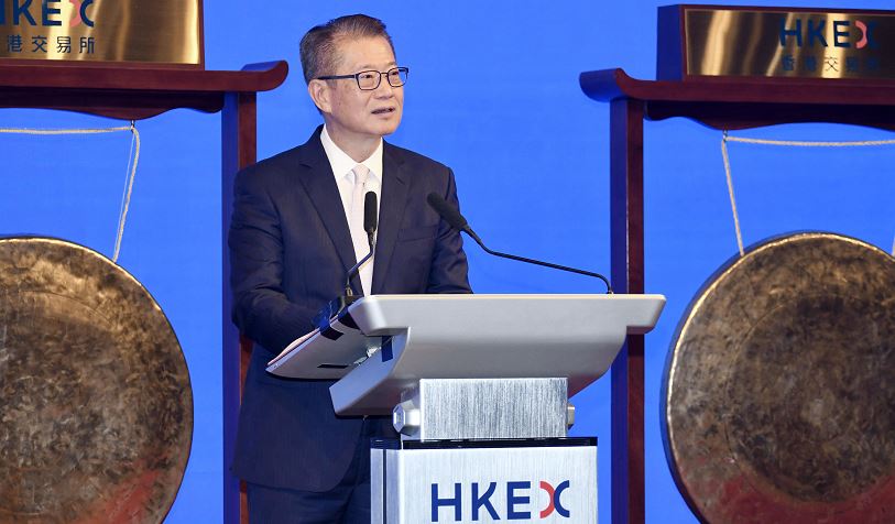 Paul Chan delivered a speech at the Hong Kong Stock Exchange on July 8 as six high-tech industrial firms debuted.