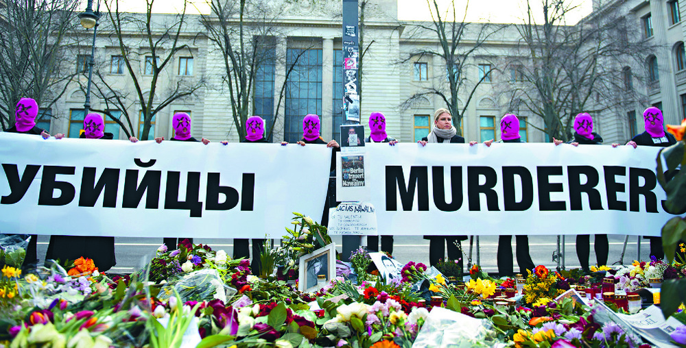 Russian protest group Pussy Riot spells out in Berlin what many are suspecting over Alexei Navalny's death. Right: Yulia Navalnaya with her husband in 2015. Russian protest group Pussy Riot spells out in Berlin what many are suspecting over Alexei Navalny's death. Right: Yulia Navalnaya with her husband in 2015.