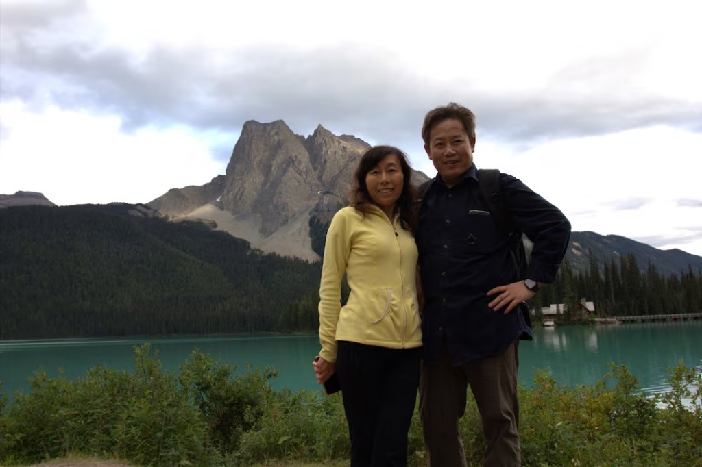 Dr. Yufang Rong and her husband Dr. Youlin Chen, an American seismologist held for nearly two years by China, pose together in this undated photograph provided on July 13, 2026. Courtesy Dr. Yufang Rong/Handout via REUTERS